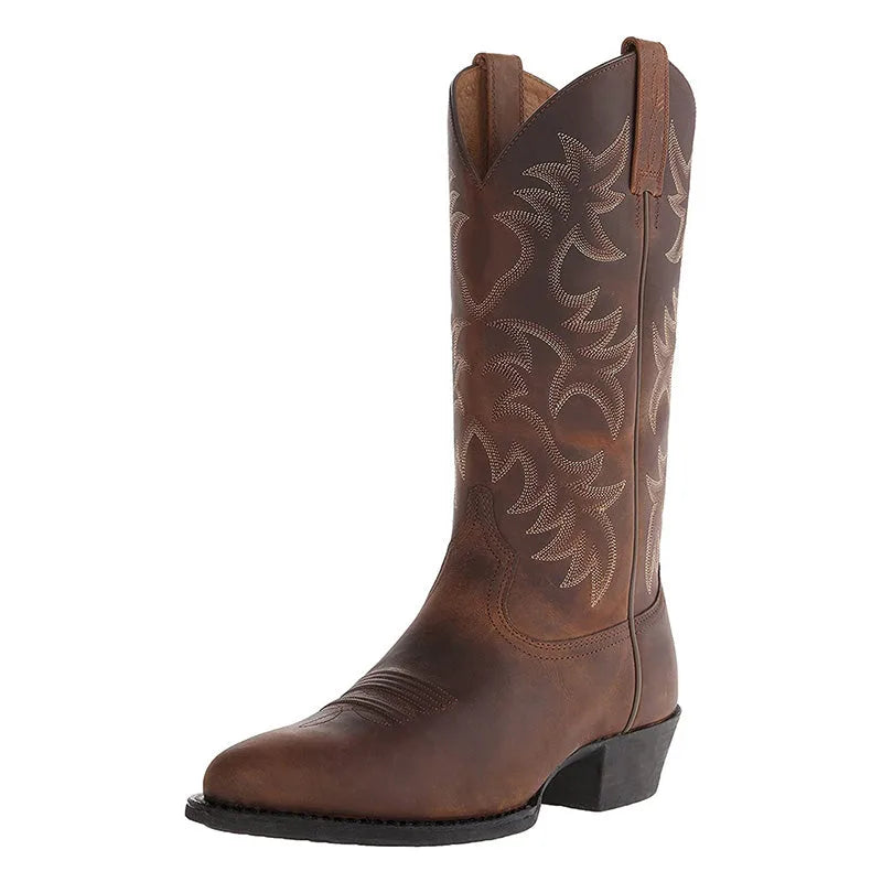 Three-quarter angle view of a brown leather cowboy boot highlighting the embroidered shaft pattern
