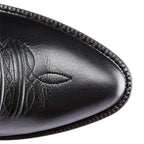 Close-up of the black leather pointed toe cap showing the smooth finish and subtle stitching