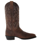 Side view of a black leather cowboy boot highlighting the grain texture and stacked heel