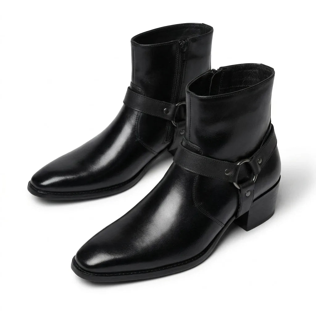 Pair of black leather harness boots with pointed toe, side zip and ring hardware detail