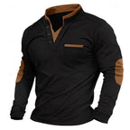Black long-sleeve polo shirt with tan contrast collar, button placket and elbow patches, worn open at the neck