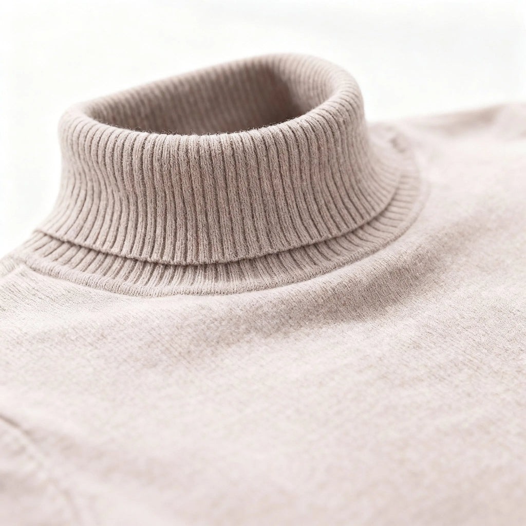 Close-up of the ribbed polo neck collar in light beige knit, showing fine knit texture