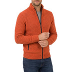 Burnt orange marl zip-through knit jumper shown from the side with ribbed collar standing up