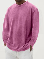Close-up front view of a magenta pink washed knit jumper showing the soft brushed fabric texture