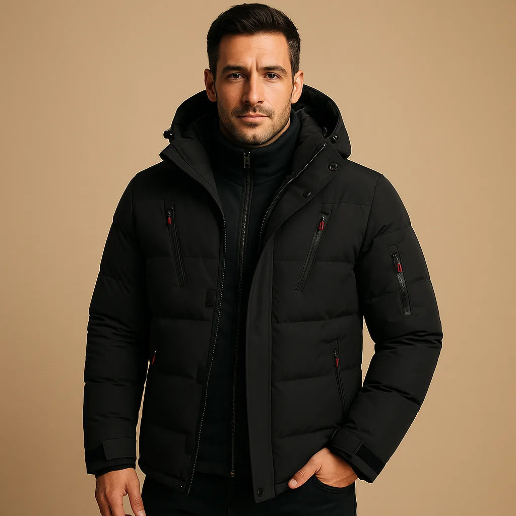 Black padded puffer jacket with hood up, black zip pockets and ribbed cuffs, close front view.