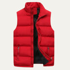 Side angle of a black quilted gilet showing the full-length zip and armhole seam detail
