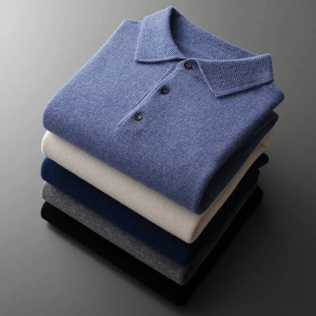 Side angle of the folded blue polo jumper highlighting the knit texture and long sleeve