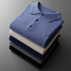 Side angle of the folded blue polo jumper highlighting the knit texture and long sleeve