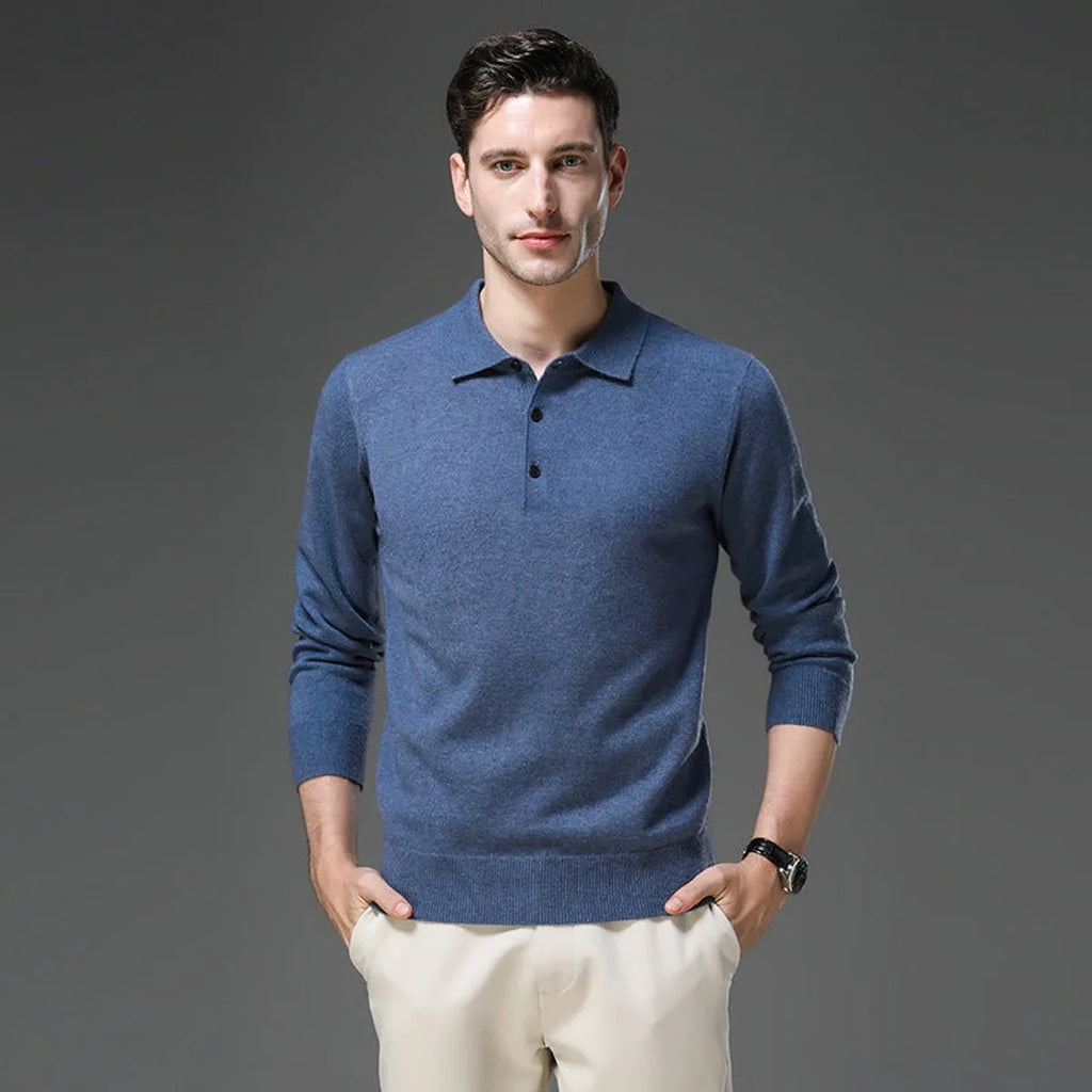 Close-up of the ribbed polo collar and button placket on the folded knit jumper