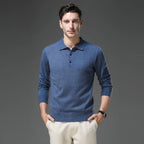 Close-up of the ribbed polo collar and button placket on the folded knit jumper