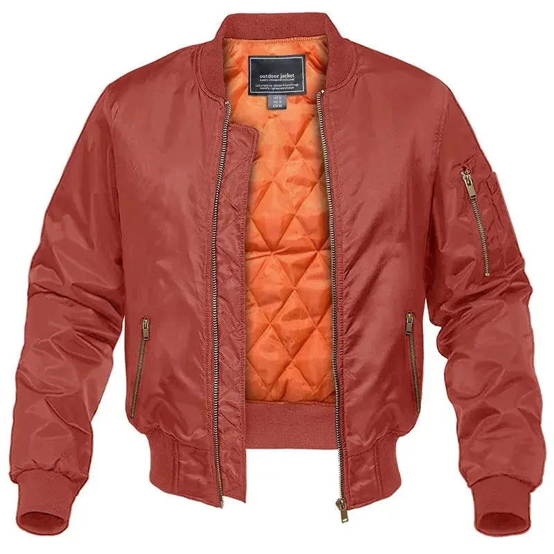 Rust red bomber jacket, front open view showing the orange quilted lining, zippered chest pocket and side pockets.