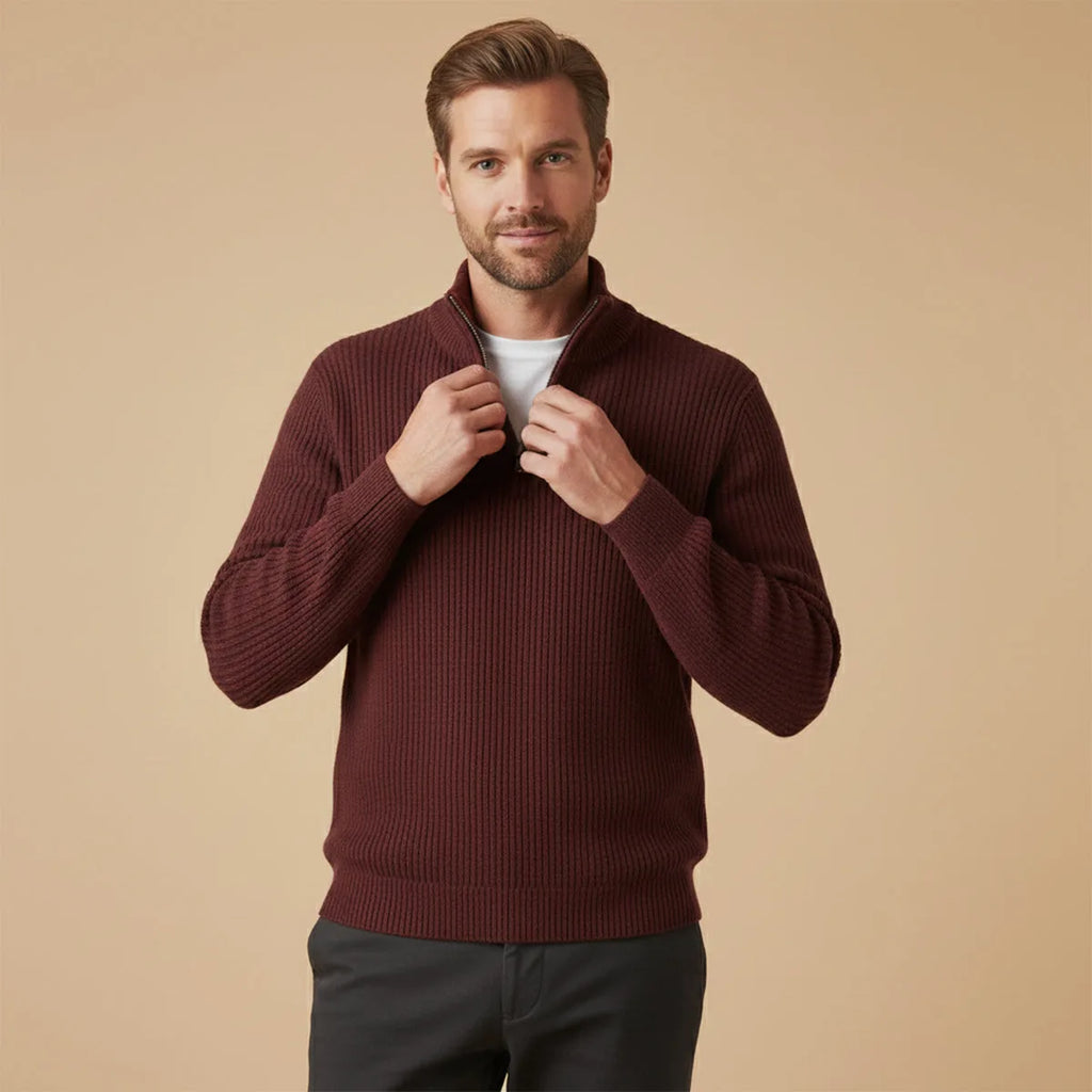Side angle of the stand-up collar with zip partially open on the knit jumper