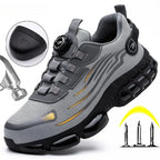 Grey mesh safety trainer with reinforced toe cap inset, rotary dial lacing, hammer icon and anti-puncture sole graphic
