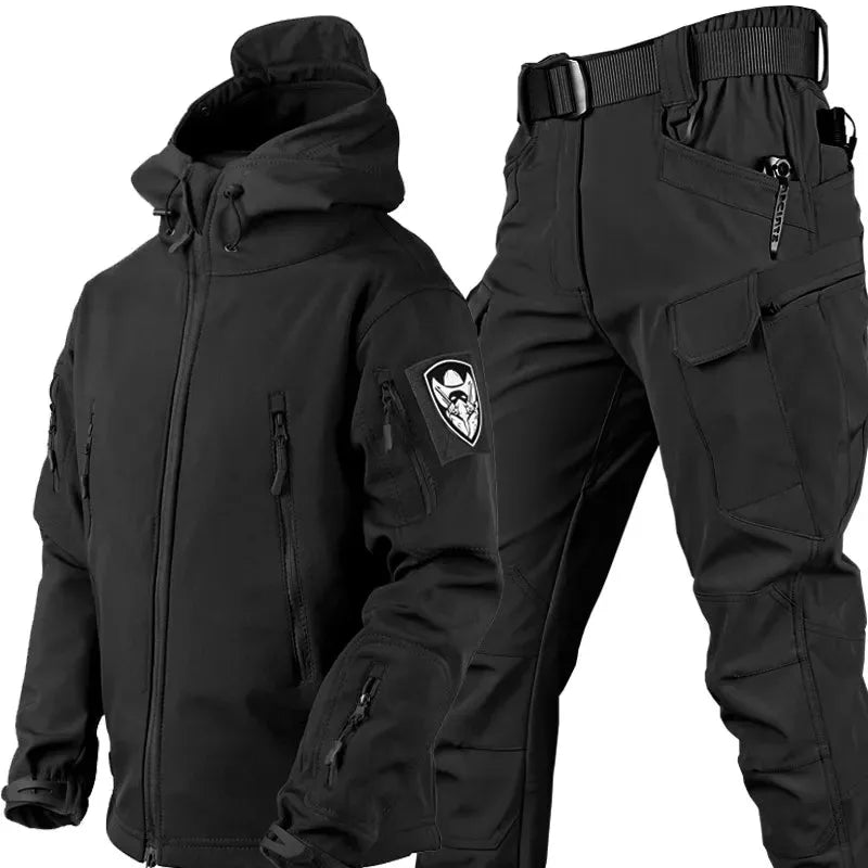Black tactical softshell jacket and trousers set with adjustable hood, chest zip pockets and webbing belt