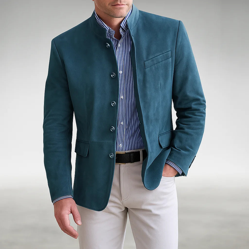 Close-up front view of a teal suede mandarin collar jacket worn open over a striped shirt