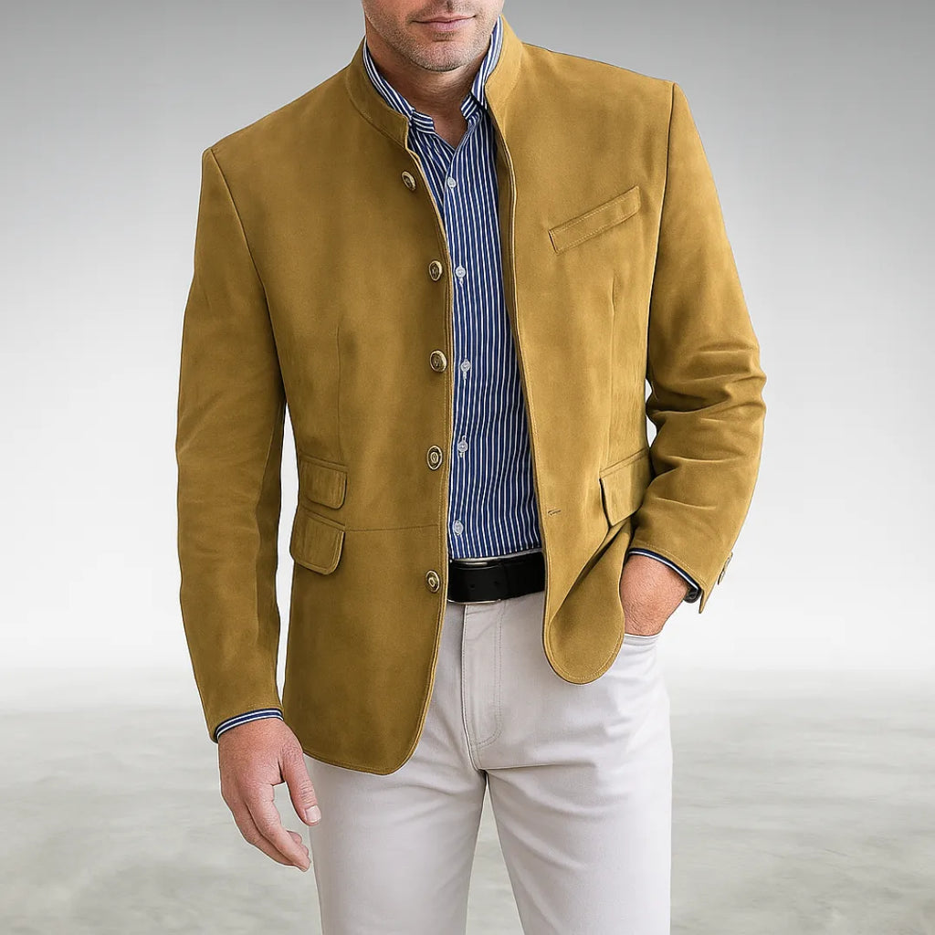 Close-up front view of a mustard yellow suede mandarin collar jacket buttoned over a striped shirt