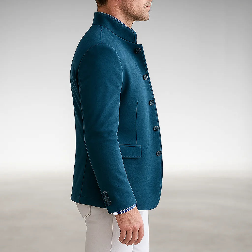 Side profile view of a teal mandarin collar jacket showing the tailored shoulder seam and button placket