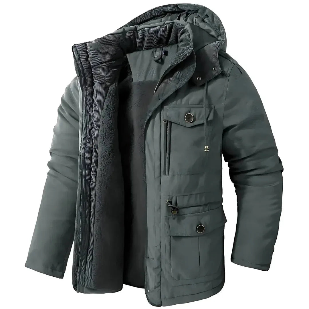 Grey hooded winter parka displayed open, showing quilted panels, corduroy hood lining and multiple front pockets