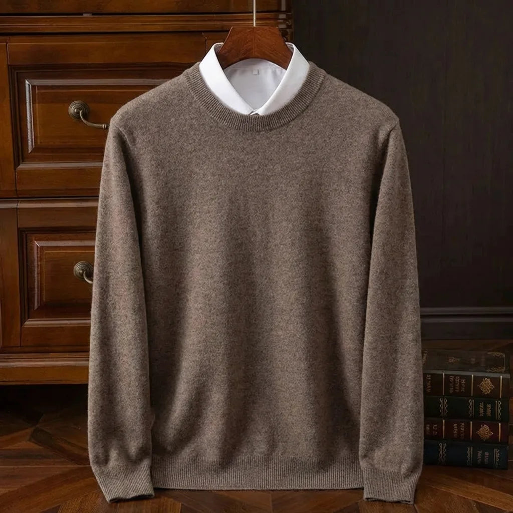 Warm taupe brown crew neck jumper with ribbed hem and cuffs, styled over a white shirt collar