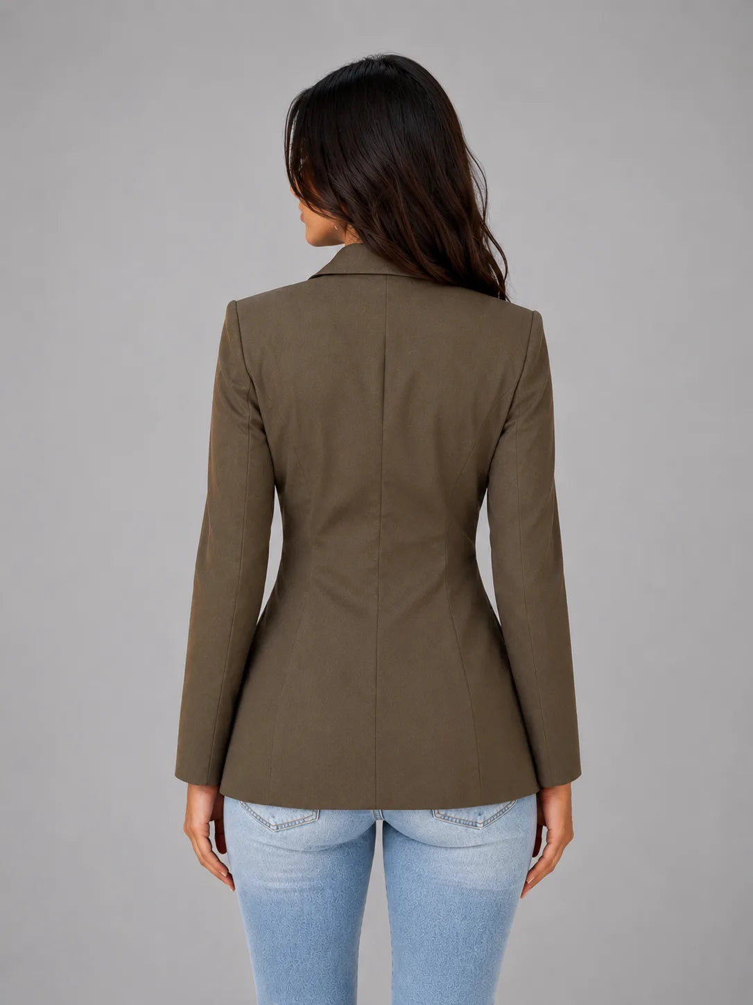 Back view of the tailored olive brown blazer showing the fitted waist seam and structured shoulder line