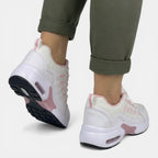 Rear view showing the air-cushion heel pod in pink and white, with black ridged outsole