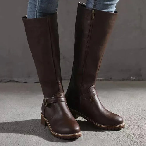Front angle of dark brown leather knee-high boots showing side zip and stacked block heel