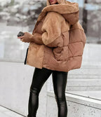 Camel puffer coat shown from the side, highlighting the quilted body and ribbed cuffed sleeves