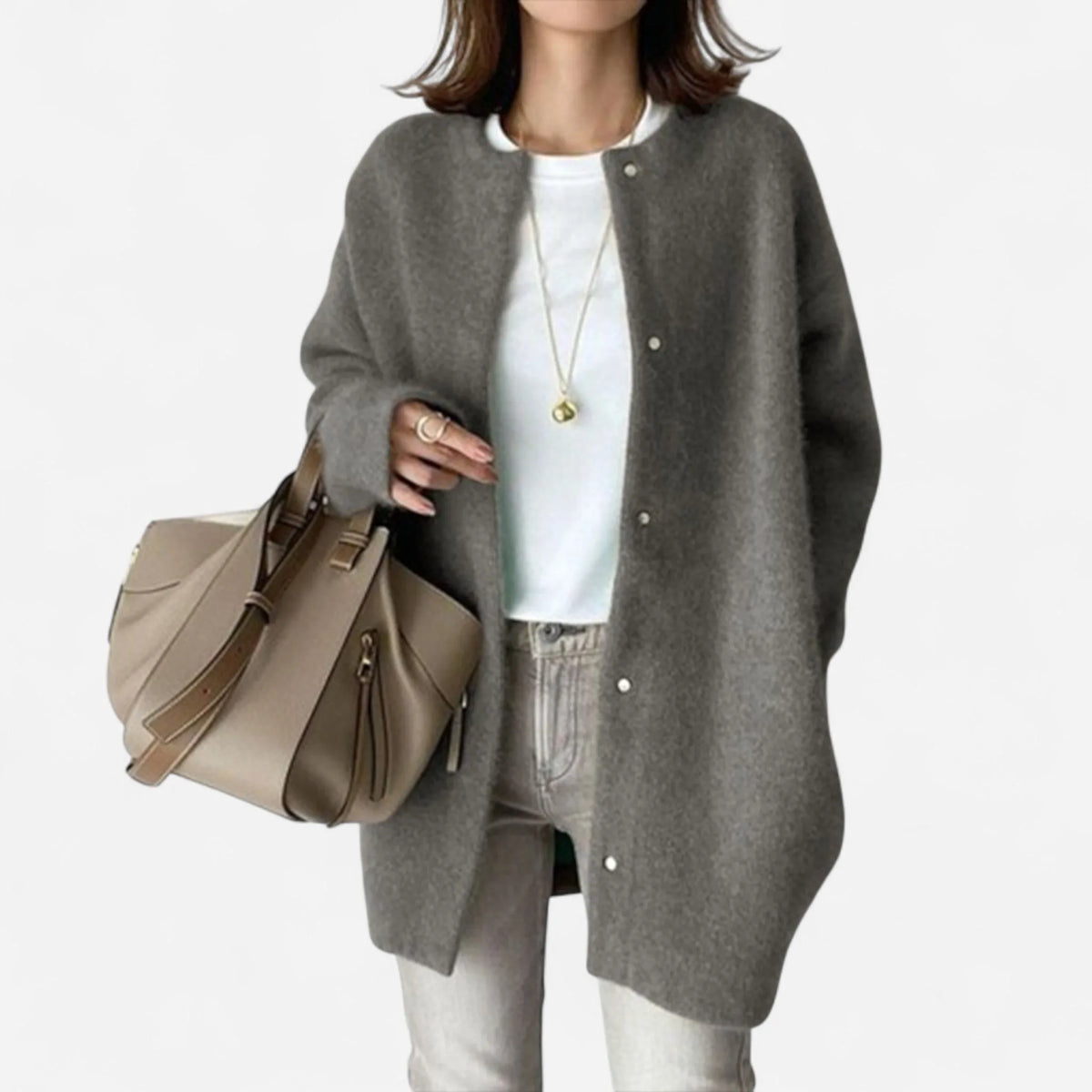 Oversized grey knit cardigan shown open, showing its relaxed slouchy fit and soft brushed knit texture.