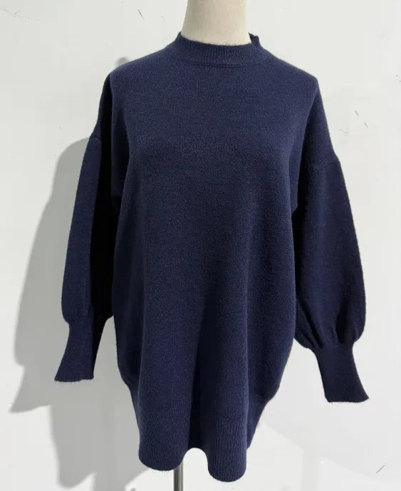 Navy blue oversized knit jumper, front angle highlighting the mock neckline and voluminous sleeves