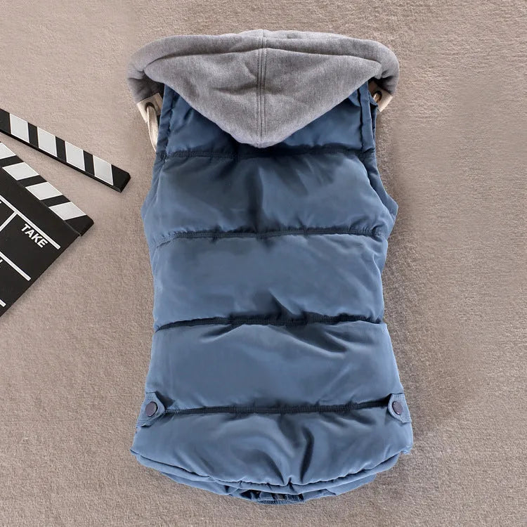 Back view of granite blue padded gilet showing quilted panelling and grey hood