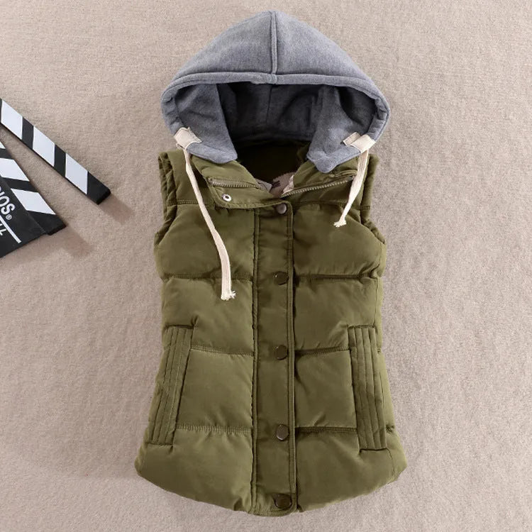 Olive green padded gilet with grey jersey hood, laid flat showing quilted front panels