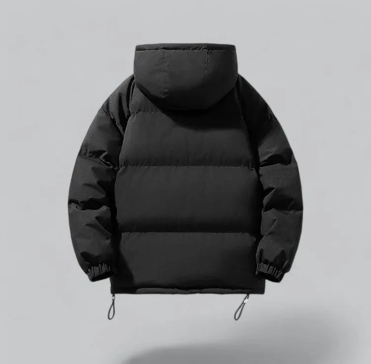 Back view of black quilted hooded jacket showing horizontal channel stitching and elasticated cuffs
