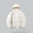 Cream white padded hooded jacket zipped up, showing the full rounded puffer silhouette