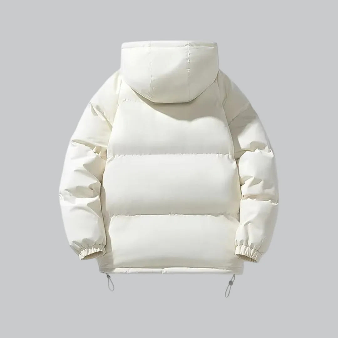 Back view of cream white quilted hooded jacket with horizontal panel seams and hood detail