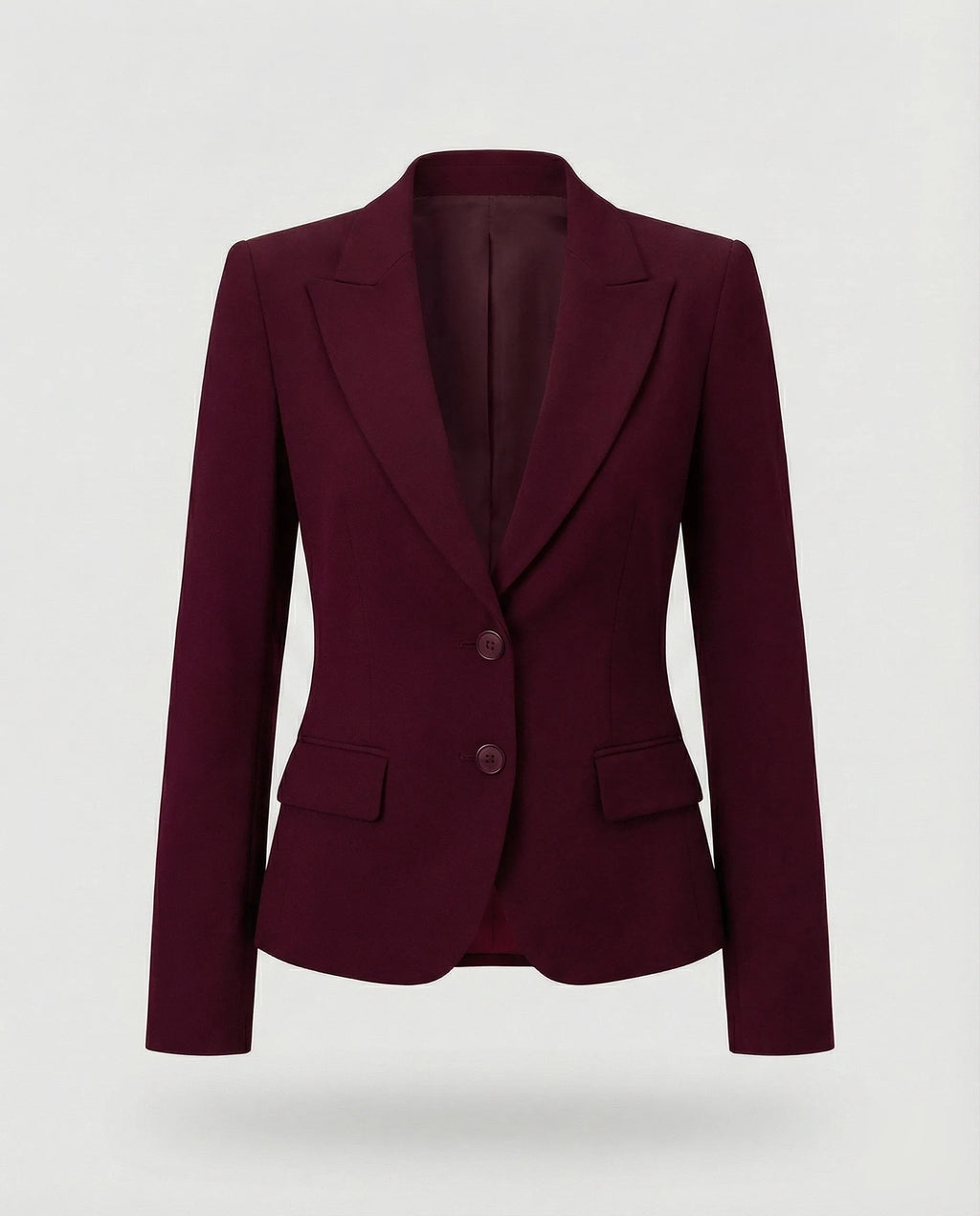 Front view of a burgundy peplum blazer showing the fitted waist and flared hem
