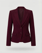Front view of a burgundy peplum blazer showing the fitted waist and flared hem