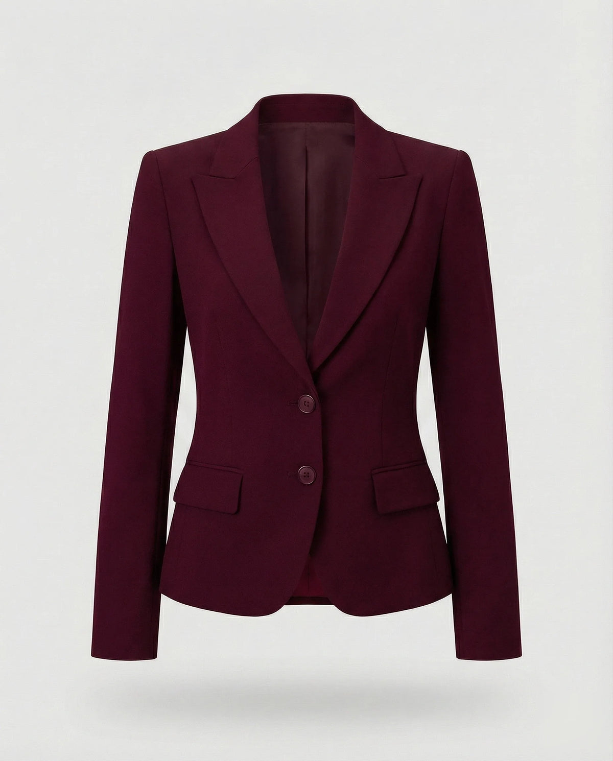 Front view of a burgundy peplum blazer showing the fitted waist and flared hem