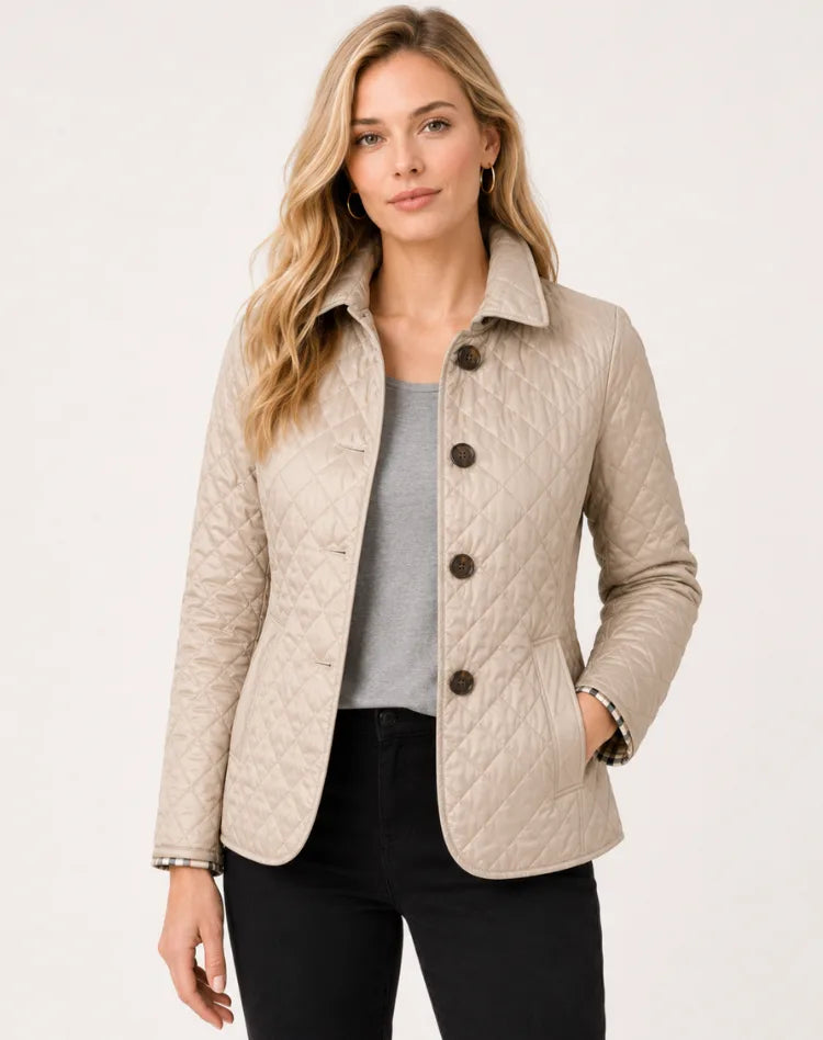 Beige quilted jacket with checked lining visible at cuffs and pockets, worn with grey top