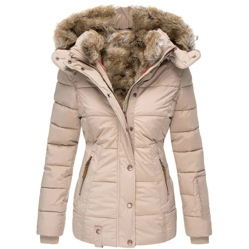 Front view of beige quilted parka with tan faux fur trimmed hood and bronze hardware fastenings