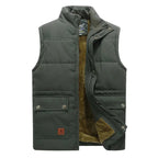 Olive green quilted body warmer with front snap fastening, stand collar and patch pocket on the chest