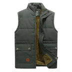 Olive green body warmer shown open, displaying the warm tan fleece lining and inner zip fastening
