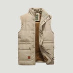 Beige quilted body warmer laid flat and open, showing the soft fleece interior and front pocket flaps