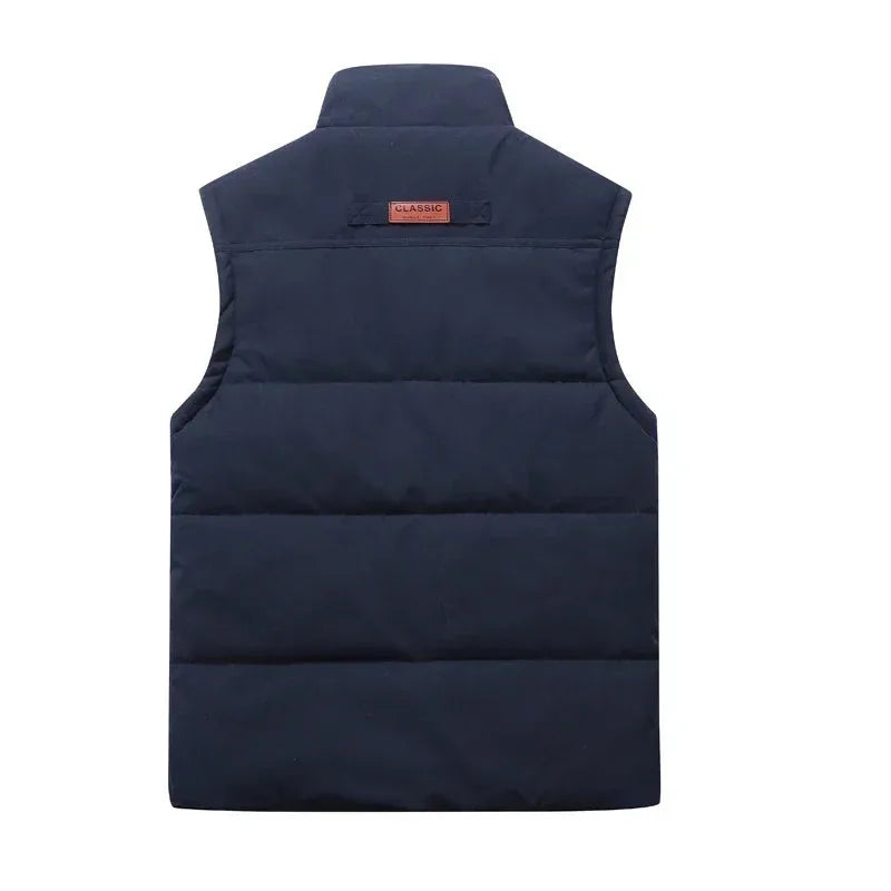 Back view of navy quilted body warmer showing the stand collar and clean, seam-free panelled back