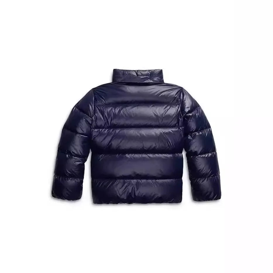 Back view of the navy puffer jacket with the hood folded down into a stand collar