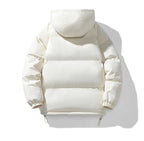 Back view of an ivory puffer jacket with quilted panels and a soft, structured hood