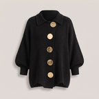 Black ribbed-knit cardigan with gold-tone button-front closure and a dropped shoulder, front view on plain background
