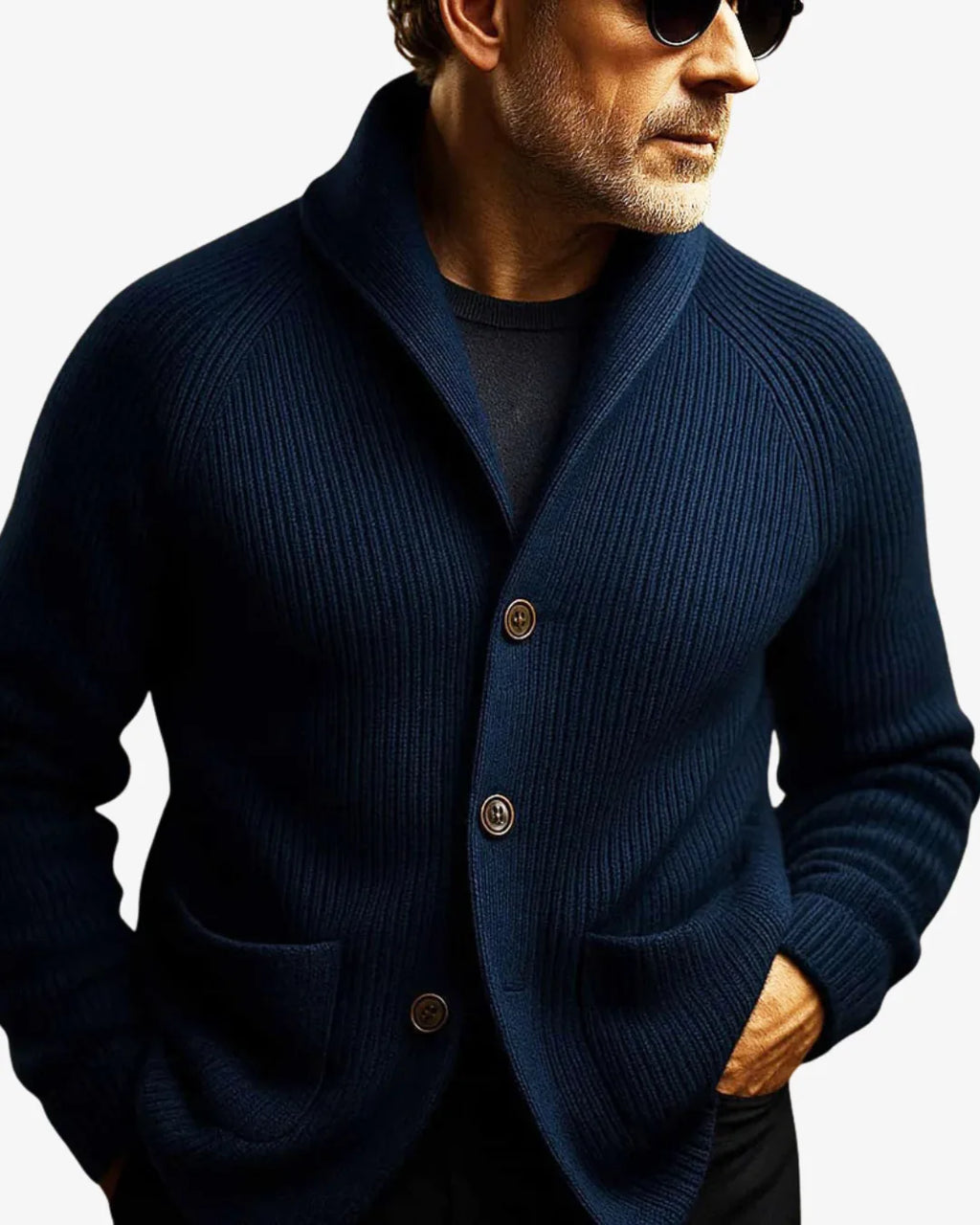 Man wearing the terracotta cardigan with hands in the patch pockets, showing the relaxed fit and ribbed texture