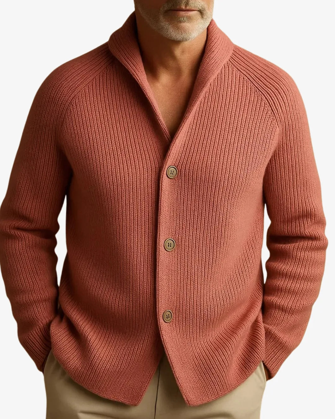 Close-up of a man wearing the terracotta ribbed knit cardigan, showing the collar and top button detail