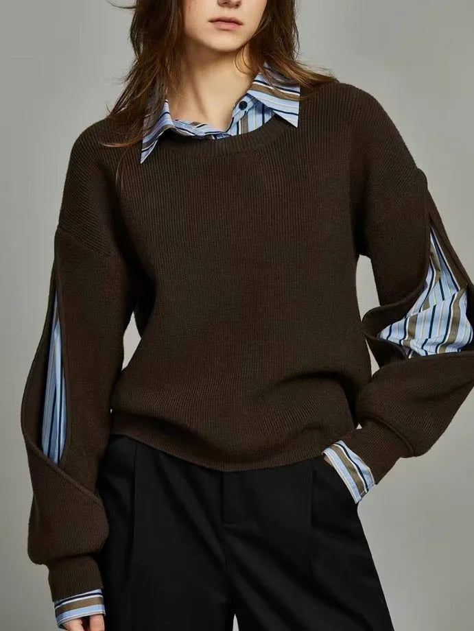 Close-up front shot of the dark brown jumper with crew neck and layered striped shirt collar peeking out
