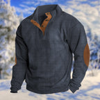 Navy blue ribbed knit jumper with stand collar, leather buttoned placket and tan elbow patches